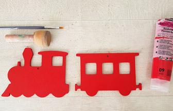 train et wagon en bois peint en rouge